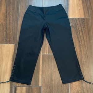 Black capri pants with lace up detail on legs